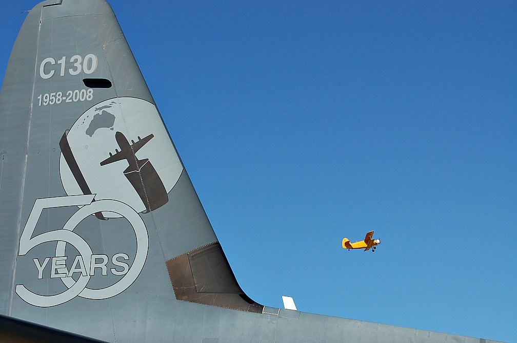 12-Hercules-rear-fin-with-Tiger-Moth-flying-in-the-background